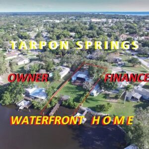 T A R P O N    S P R I N G S    OWNER  FINANCE WATERFRONT HOME FOR SALE